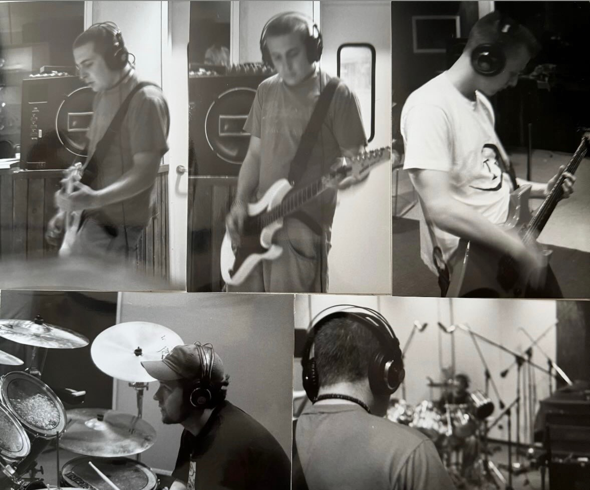 Tex's first band wellspring recording in the studio, four members on guitars, bass, and drums in headphones.